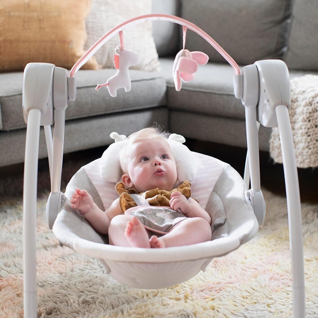 Ingenuity Comfort 2 Go Compact Portable 6-Speed Cushioned Baby Swing with Music, Folds Easy, 0-9 Months 6-20 lbs (Pink Flora the Unicorn)